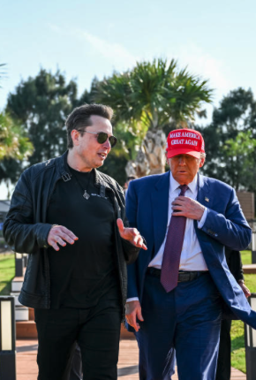 Elon Musk and President-elect Donald Trump talk as he arrives to attend a viewing of the launch of the sixth test flight of the SpaceX Starship rocket on Nov. 19 in Brownsville, Texas. (Brandon Bell/Getty Images) · Brandon Bell via Getty Images